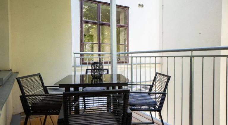 Bright & Airy Apartment with Balcony near City Center — photo 5