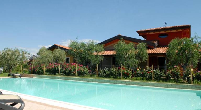 Vacation home with pool & yard in Manerba del Garda