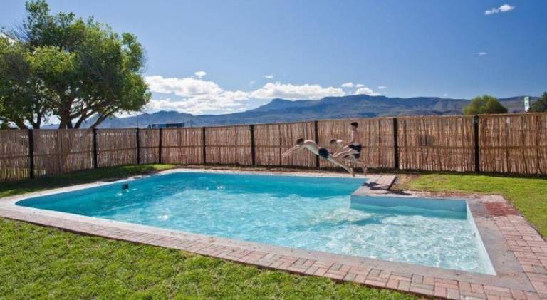 Lodge with terrace, garden & pool — photo 4