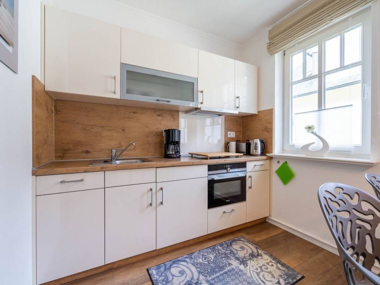 Komfortplus Ferienwohnung mit 1 Schlafzimmer und Balkon im Obergeschoss — photo 4