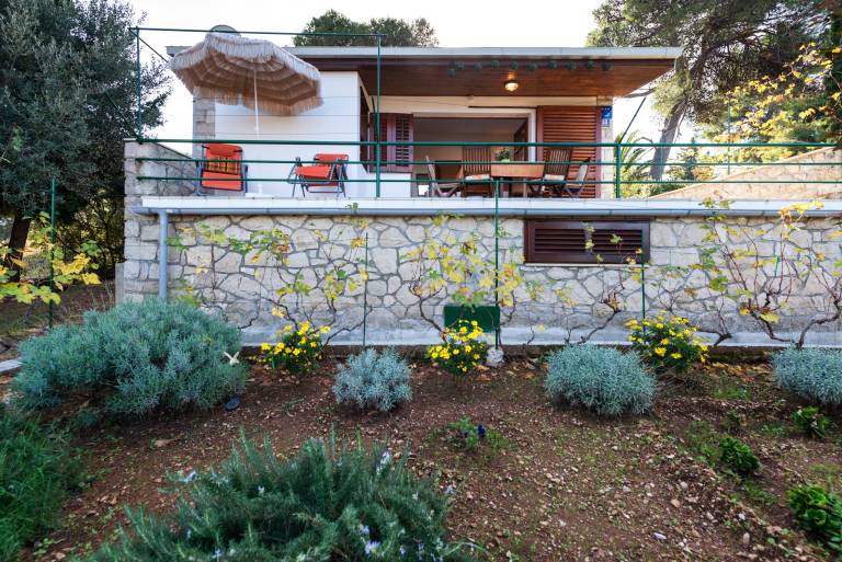 Two bedroom house with terrace and sea view Postira, Brač (K-6052) in Postira