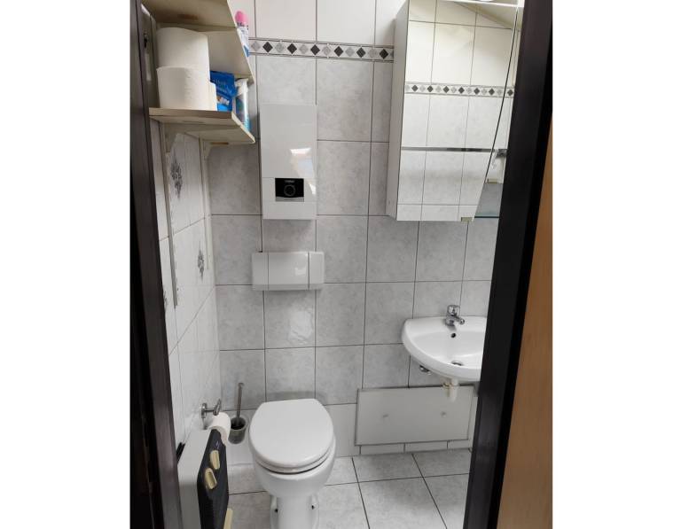 Ebenerdiger Reihenendbungalow mit eingezäunten Grundstück in Fedderwardersiel. — photo 5