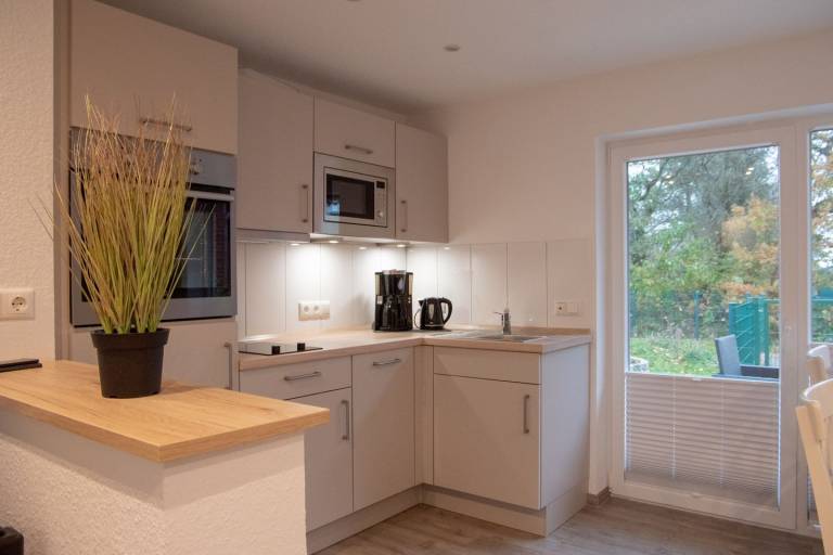 Ferienhaus Seestern mit moderner Ausstattung und eingezäuntem Garten — photo 2