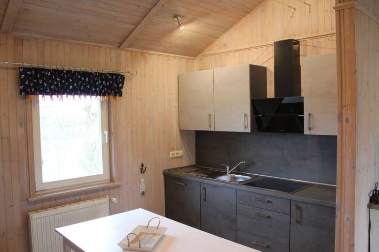 Komfortables Ferienhaus in Holzbauweise für fünf Personen — photo 2