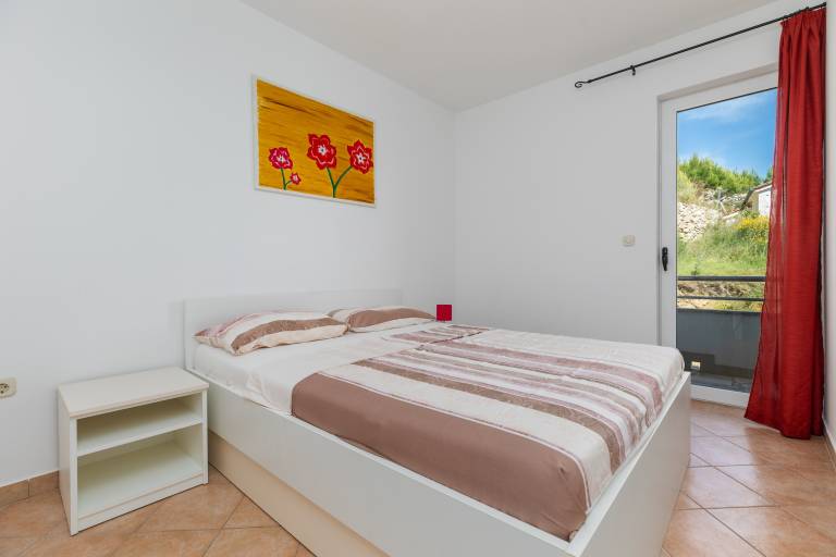 Two bedroom apartment with balcony and sea view Lokva Rogoznica, Omiš (A-23105-c) in Omis