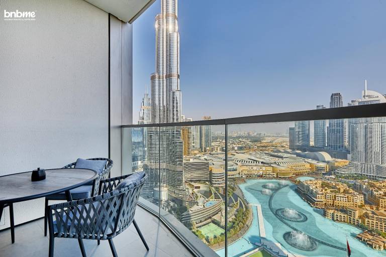 Fully equipped beautiful holiday apartment with barbecue, garden & pool | Next to Burj Khalifa | Pet-friendly in Dubai