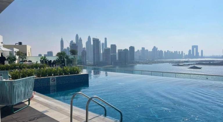 Apartment with heated pool, jacuzzi & patio | Near Palm Jumeirah | Close to the beach | Pets allowed — photo 5