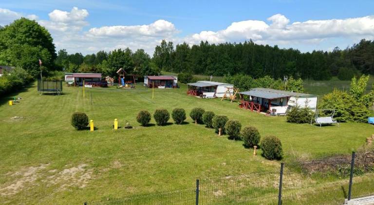 Lodge with yard, private pool & patio in Mikolajki