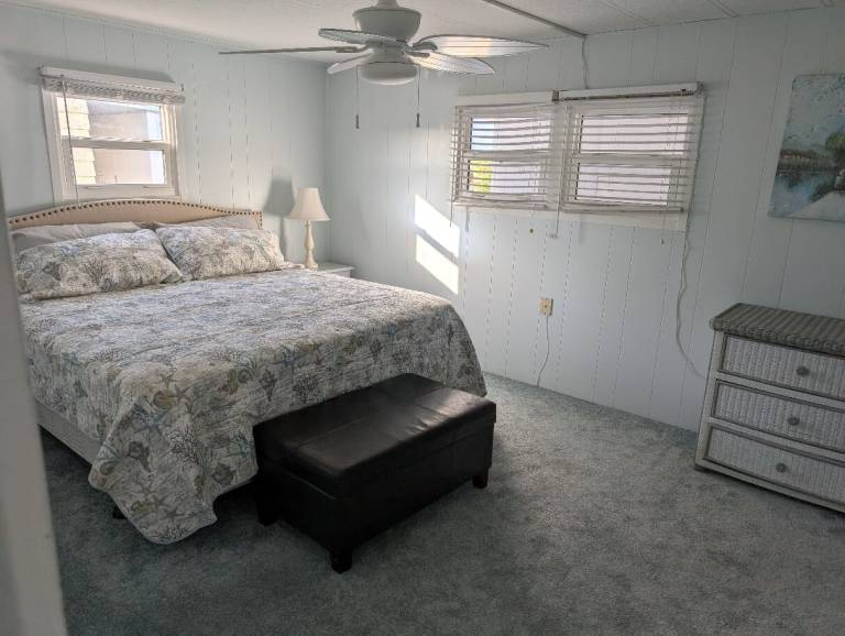 Mobile home with pool, jacuzzi & yard | Garden view — photo 2