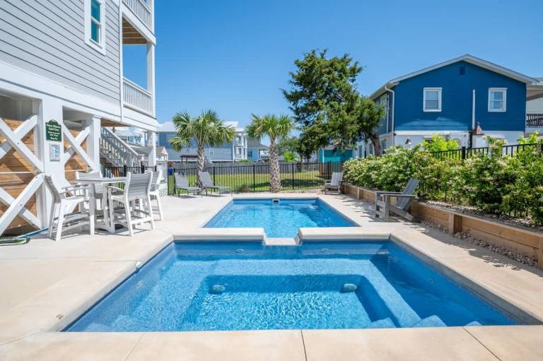 Children-friendly vacation home with pool, garden & jacuzzi | Sea view | Close to the beach | Dogs allowed in Carolina Beach, NC