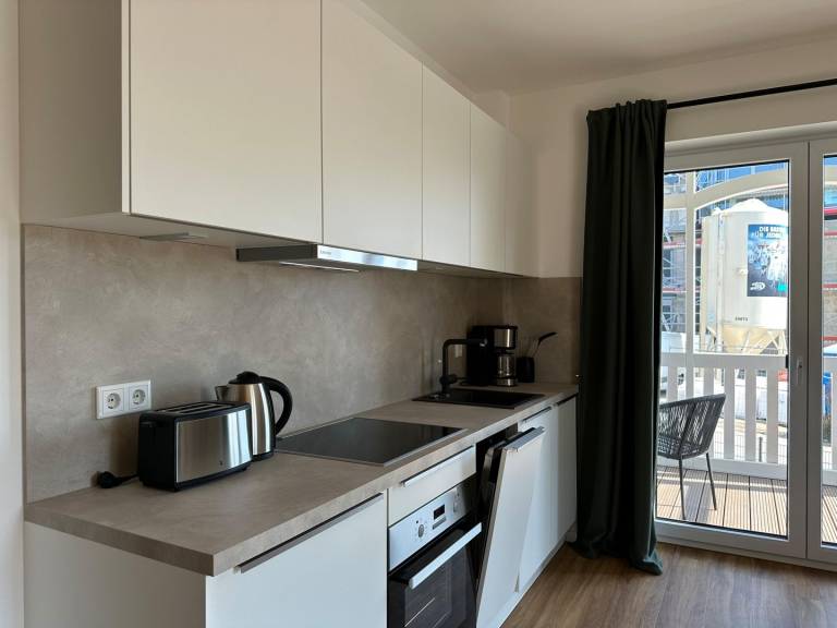 Moderne Ferienwohnung Sun mit überdachtem Balkon und Teilmeerblick in Haffkrug — photo 4