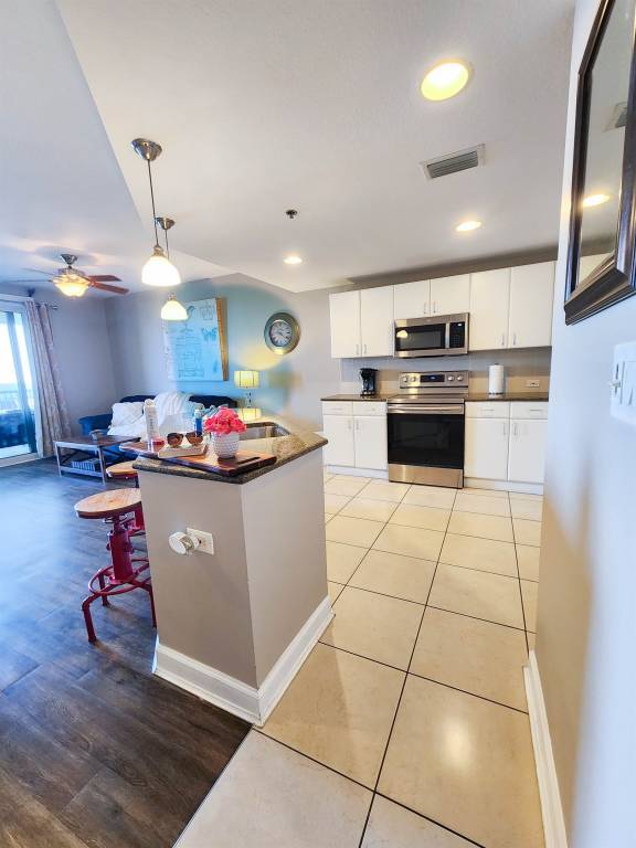 Child-friendly nice condo with grill, jacuzzi & heated pool | Water view | Beach nearby | Pets are welcome — photo 4