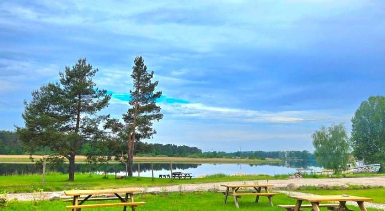 Natura Park Jurmala campsite with tent sites near a river — photo 4