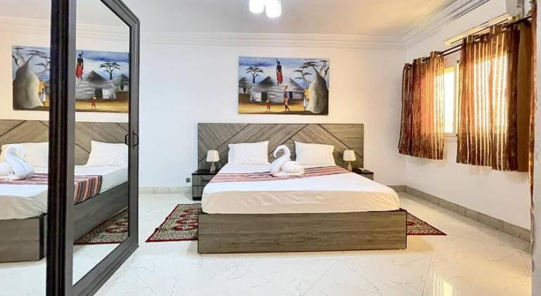 Touraco Suite Hotel Business in Mbour