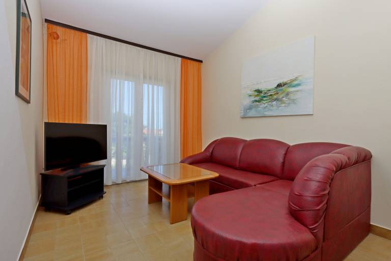 Two bedroom apartment with terrace and sea view Barbat, Rab (A-24215-a) — photo 2