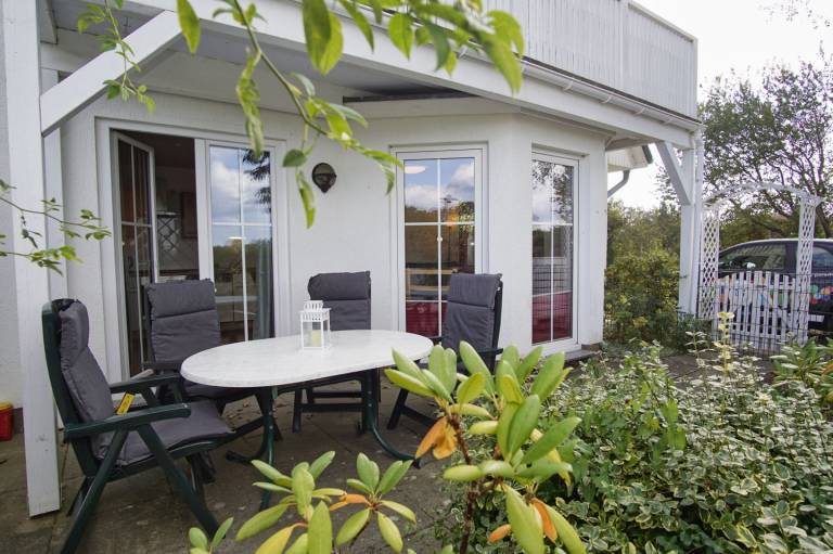 gemütliche 3-Raum-Ferienwohnung mit Terrasse und Garten - Ferienwohnung Neptun — photo 4