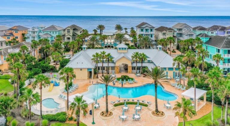 Dog-friendly condo on the golf course with ocean view, pools, gym & beach access in Palm Coast, FL