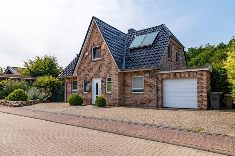 Family-oriented vacation home with barbecue, garden & patio | Garden view | Pet-friendly in Hohwacht