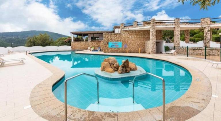 Apartment with private pool, terrace & garden in Olbia