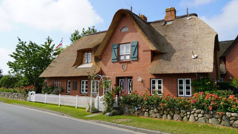 Ferien unterm Reetdach Whg 02