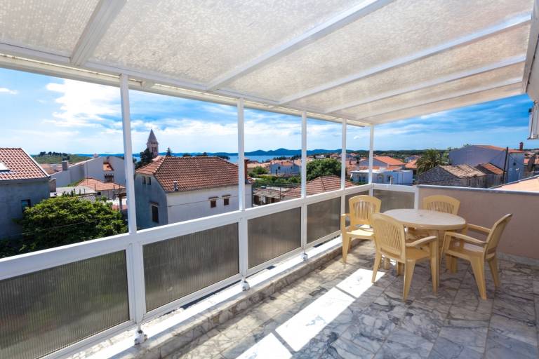 Two bedroom apartment with terrace and sea view Pakoštane, Biograd (A-24768-a) in Biograd na Moru