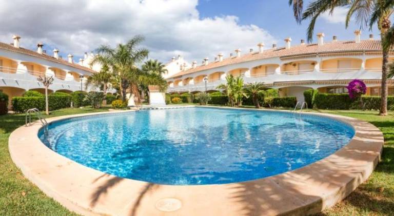 Holiday apartment with terrace, yard & pool in Denia