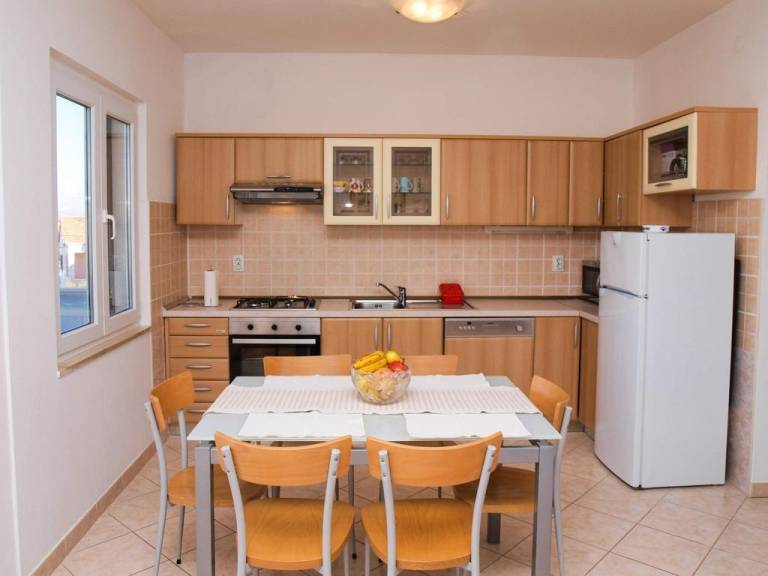 Two bedroom apartment with terrace and sea view Postira, Brač (A-17323-a) — photo 5