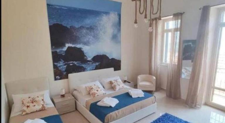 Vacation home with 1 room for 5 persons in Aci Castello