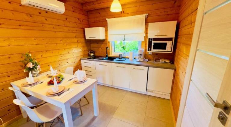 Biale Domki Paula Rewal - Domki z klimatyzacja, w obiekcie Jacuzzi i darmowe Wifi! — photo 3