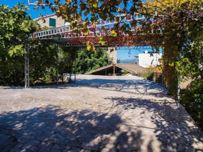 Two bedroom apartment with terrace and sea view Postira, Brač (A-17323-d) in Omis