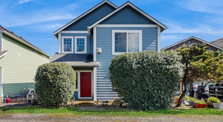Dog-friendly home near the ocean with gas fireplace & partial water views in Newport, OR