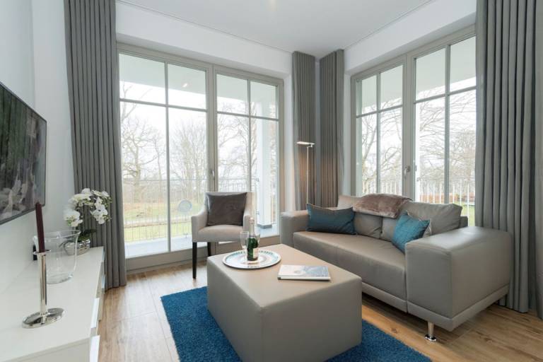 moderne Ferienwohnung mit eigener Sauna und Balkon - Villa Pauline FeWo 06 — photo 3
