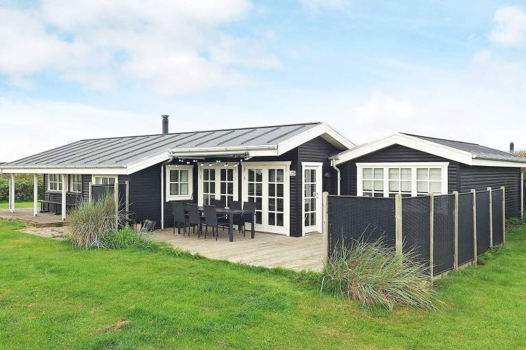 Vacation home with terrace & yard in Lokken