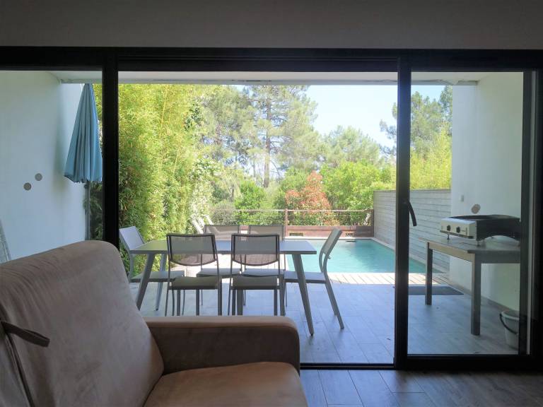Holiday apartment with patio, private pool & yard | Sea view — photo 3