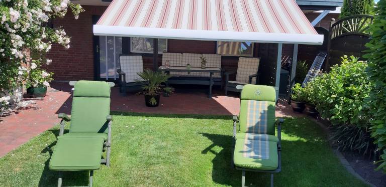 Holiday apartment with BBQ, patio & garden | Garden view — photo 2