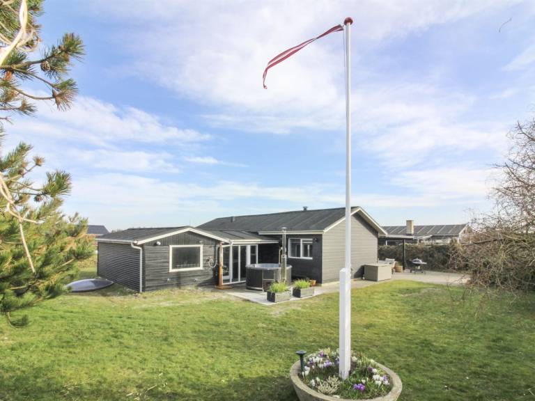Vacation home with patio, jacuzzi & garden in Lokken