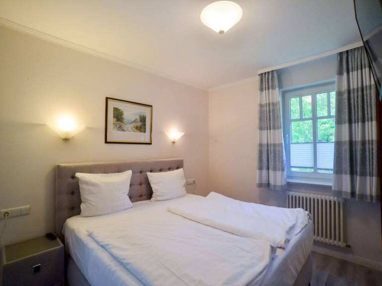 Komfortplus Ferienwohnung mit 1 Schlafzimmer und Terrasse — photo 3