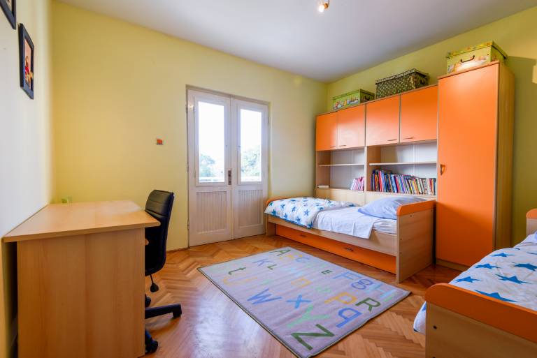 The apartments consists of two bedrooms, a bathroom, a kitchen and a living room — photo 2