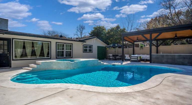 Relaxed Luxury Pet Friendly Home with Pool and Backyard Lounge in San Antonio, TX in San Antonio, TX