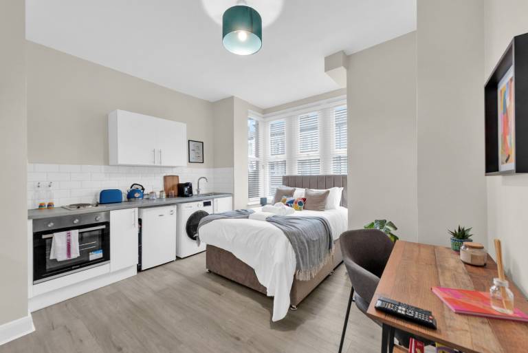 Sunny Serenity Studio Living with a Breeze