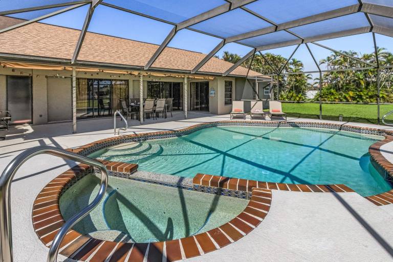 Vacation home with garden, grill & private pool in Cape Coral, FL