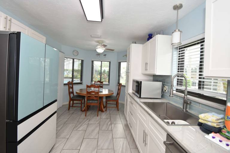 Salty Breeze Canal Front Pool Home W boat dock — photo 5