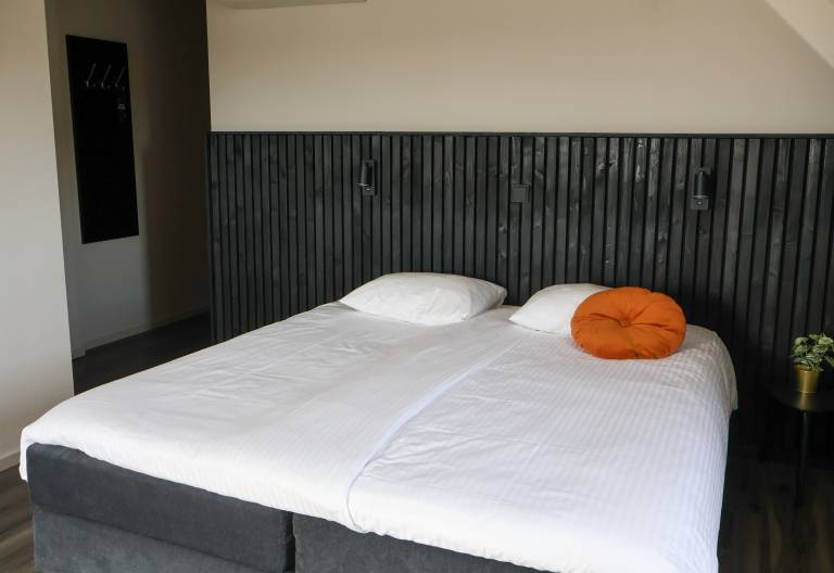 Comfortable hotel room with stunning views modern amenities and a relaxing atmosphere in the Land of Maas and Waal