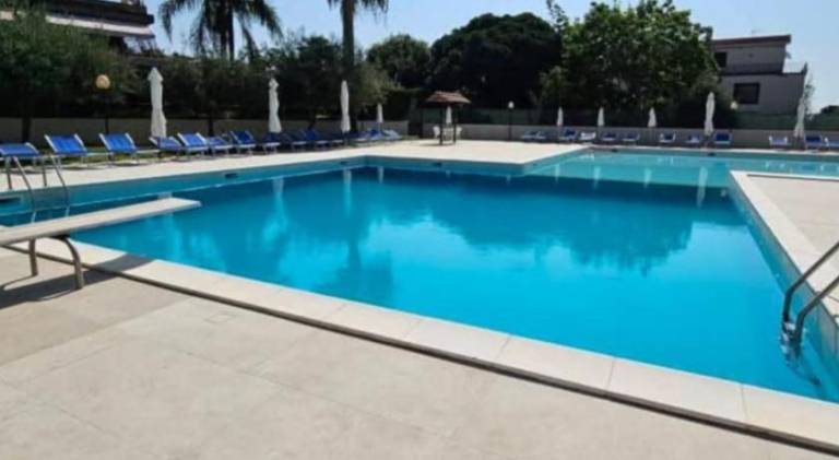 Holiday apartment with pool in Aci Castello