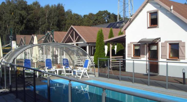 Lodge with patio, pool & garden | Pets are welcome in Miedzyzdroje