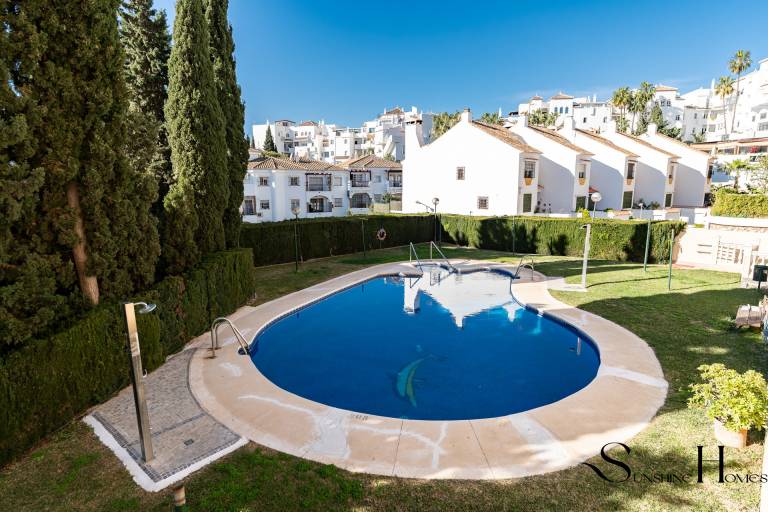 Holiday apartment with terrace, yard & pool in Torremolinos