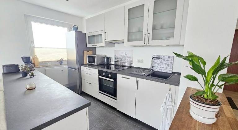 Ferienwohnung Sunset - Traumhafter Seeblick & Sauna in Steinhude — photo 2