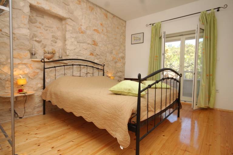 Two bedroom apartment near beach Cove Karkavac - Šćedro, Hvar (A-8801-d) in Jelsa
