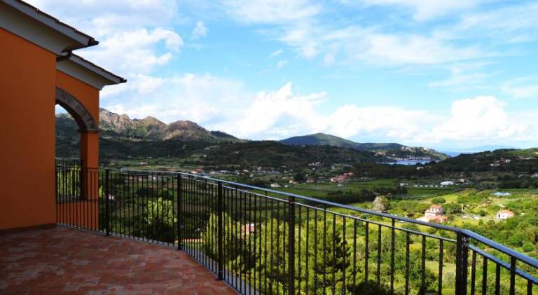 Apartment with yard, patio & barbeque in Porto Azzurro
