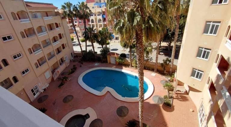 Lovely holiday apartment with terrace & private pool | Close to the beach | Pets allowed in Roquetas de Mar